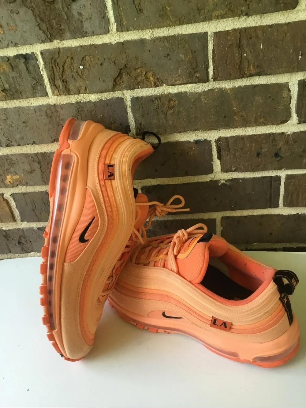 Nike Women’s Air Max 97 in Orange and Coral